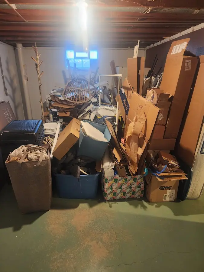 Roll-off dumpster container at job site for Yard Waste Dumpster Rental in Asbury Park